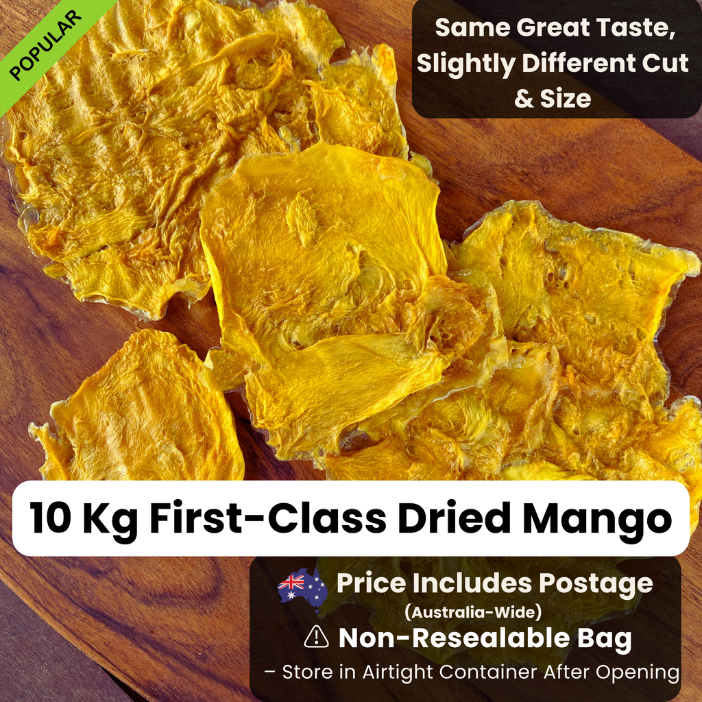 Close-up of 10 Kg First-Class Australian Dried Mango slices on a wooden board. Naturally sweet, chewy, and free from additives. Includes free shipping Australia-wide. Bulk-pack for value with non-resealable packaging.