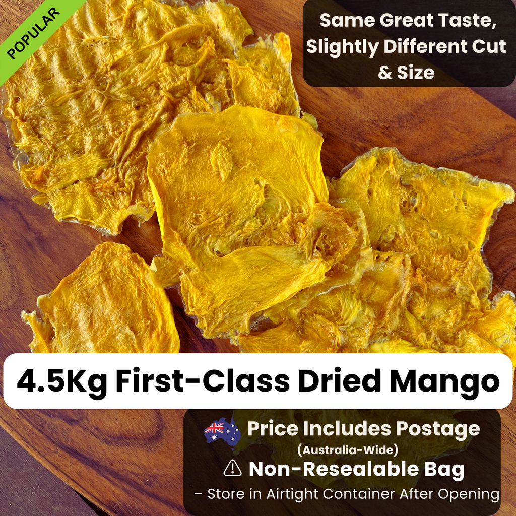 Close-up of 4.5Kg First-Class Australian Dried Mango slices on a wooden board. Naturally sweet, chewy, and free from additives. Includes free shipping Australia-wide. Bulk-pack for value with non-resealable packaging