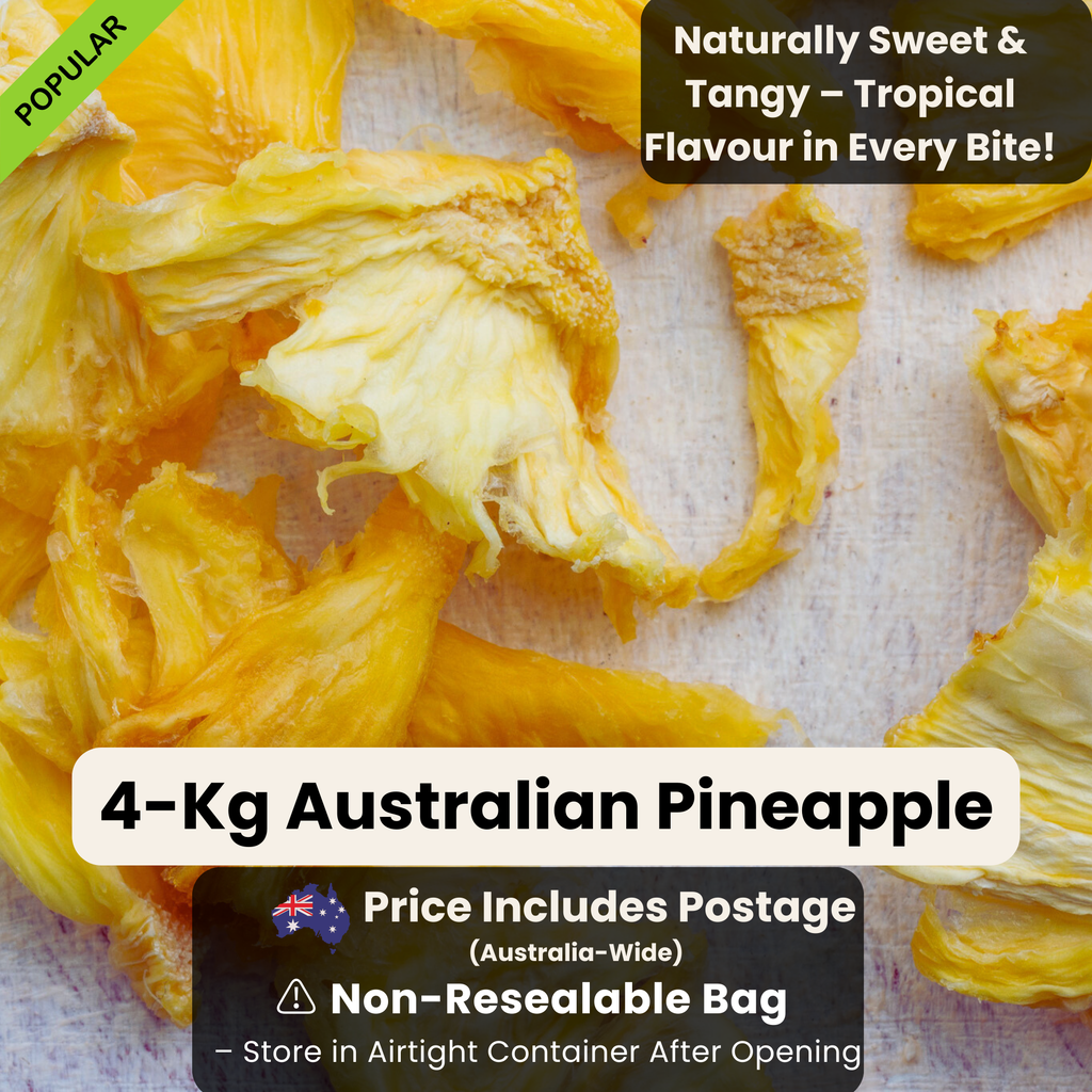 Close-up of premium 4kg Australian dried pineapple pieces, naturally sweet and tangy, golden yellow with a chewy texture. Includes free Australia-wide postage and comes in a non-resealable bag. Best stored in an airtight container after opening.