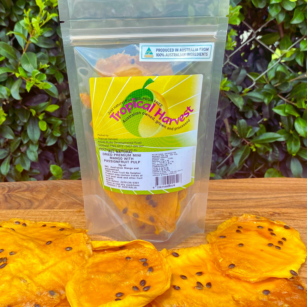 70g resealable bag of Tropical Harvest dried mango with passionfruit pulp, ideal for a grab-and-go snack.